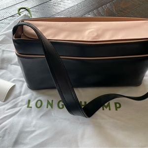 New Longchamp purse.  Never worn.